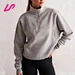 Elevate your casual look with a quarter zip sweatshirt. Cozy and versatile, this top is perfect for autumn layering. Shop now and add it to your wardrobe essentials!